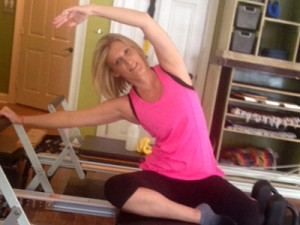 staci wise doing mermaid on the reformer cropped